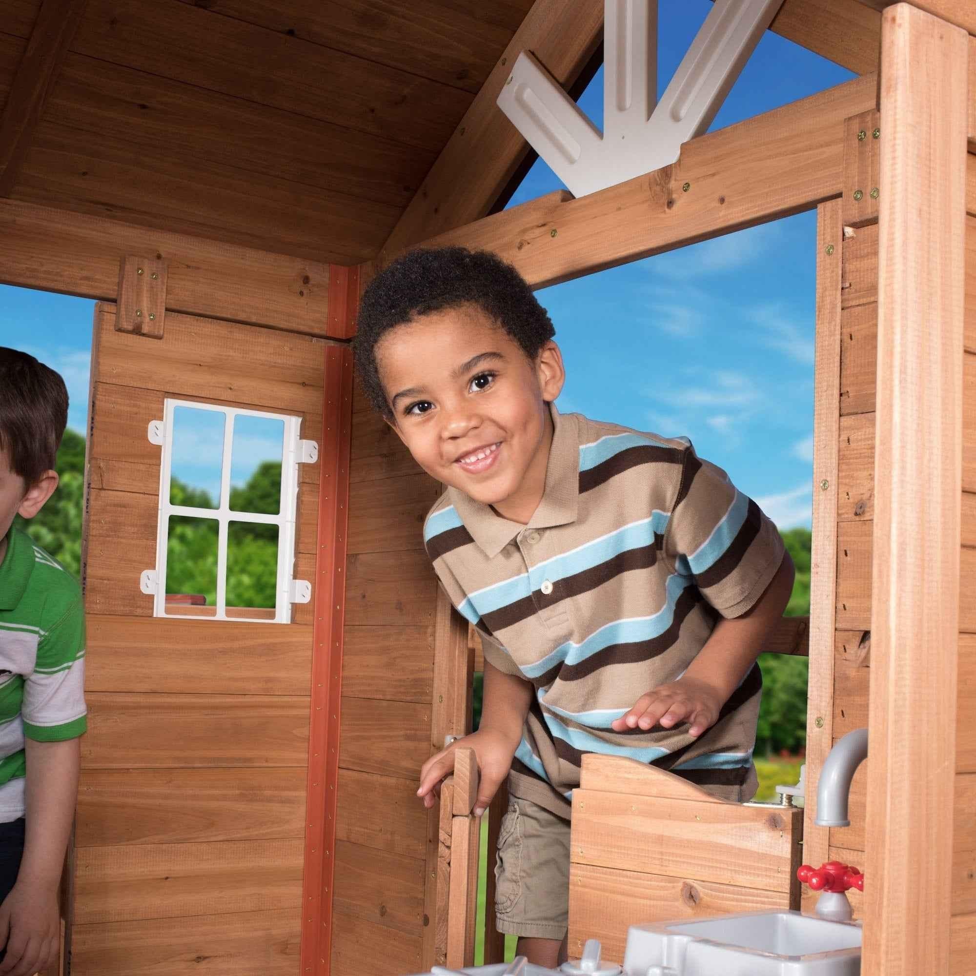 Backyard Discovery Scenic Heights Wooden Playhouse.